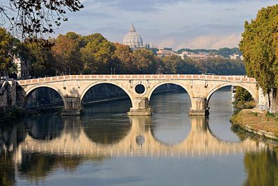 Bridge over river against sky