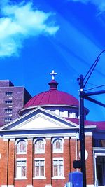 Low angle view of building against blue sky