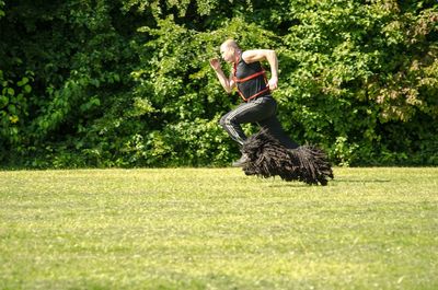 Woman on grassy field