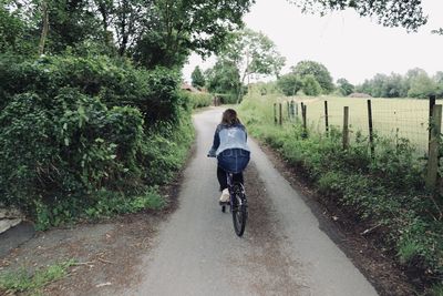 Portrait of a girl riding a bike