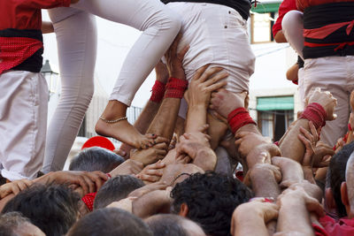 Low angle view of people performing during event