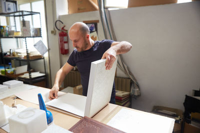 Man working on table