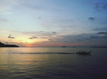 Scenic view of sea at sunset