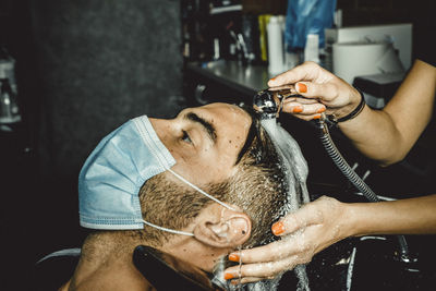 Beautician and hairdresser working with mask for the covid19 virus