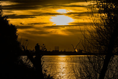 Silhouette of buildings at sunset
