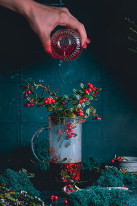 Bottle full of berries fresh ripe northern lingonberry . the concept of healthy food and organic