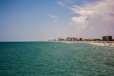 Scenic view of sea against blue sky