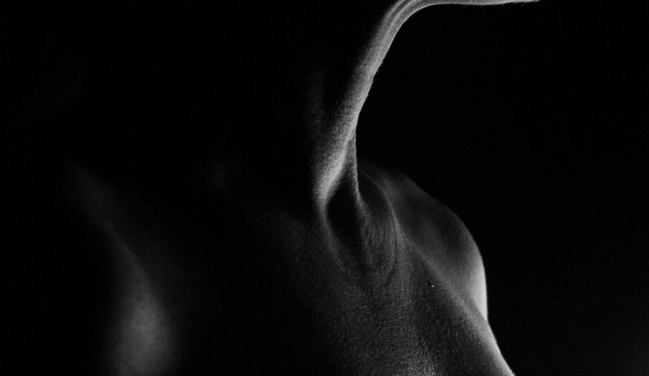 black, black and white, darkness, black background, studio shot, monochrome photography, monochrome, arm, indoors, close-up, one person, adult, back, light, limb, hand, muscular build, side view, copy space, white