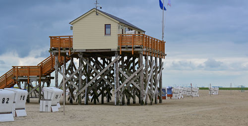 Beach chairs on a sandy beach on the north sea in sankt peter-ording