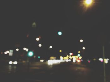 High angle view of illuminated street lights at night