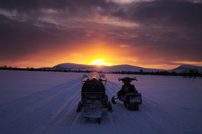 Scenic view of snow covered mountains against sky