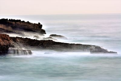 Scenic view of sea against clear sky
