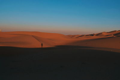 Scenic view of desert against sky