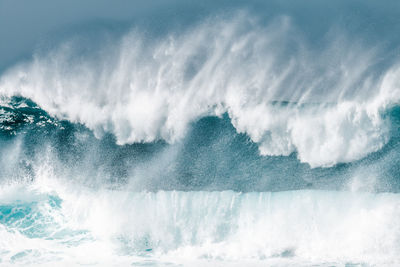 Water splashing on shore at beach