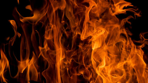 Close-up of fire against black background