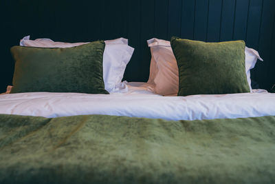 Pillows and blanket on bed at home