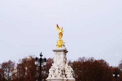 Low angle view of statue against clear sky