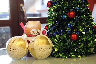 Close-up of christmas decorations on table