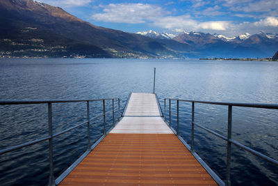 Scenic view of lake against sky during winter