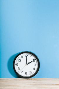 Close-up of clock on wall