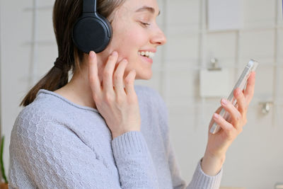 Young woman using mobile phone