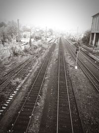 Railway tracks against clear sky