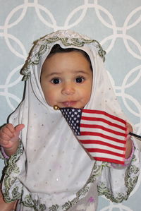 Portrait of baby with american flag