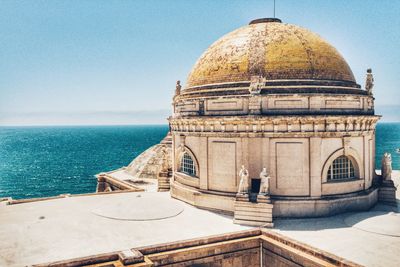 View of temple against sea