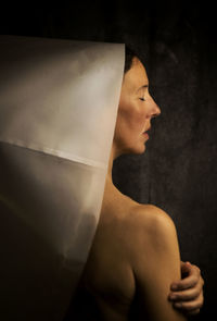 Woman in white paper hood ii