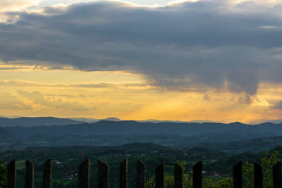 Scenic view of mountains against sky during sunset