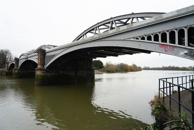 Bridge over river against sky