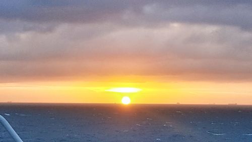 Scenic view of dramatic sky during sunset