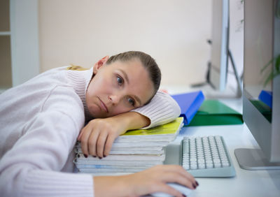 Boy using laptop at home