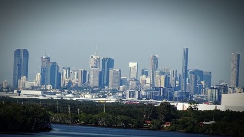 Modern buildings in city against sky