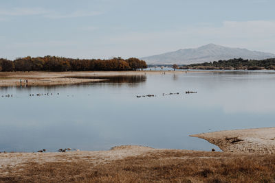 Scenic view of lake against sky