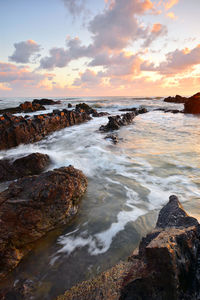 Scenic view of sea at sunset