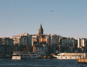 View of buildings and city against sky