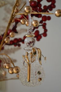 Close-up of decoration hanging on table
