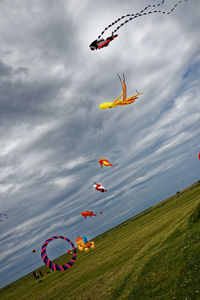 Low angle view of kite flying in sky