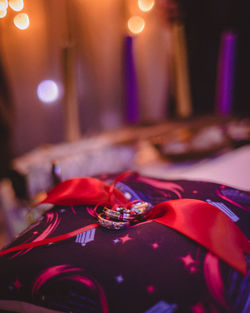 Close-up of illuminated lighting equipment on table