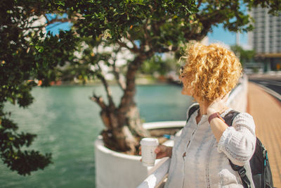 Rear view of woman looking away