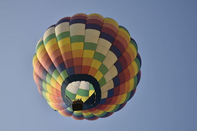 Low angle view of hot air balloons against sky