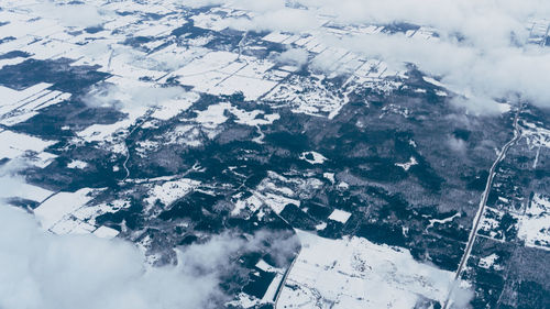 Aerial view of cityscape against sky