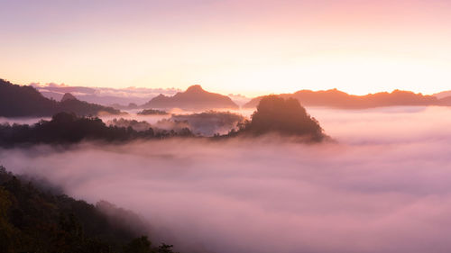 Scenic view of mountains against sky during sunset