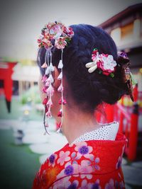 Rear view of woman wearing hat