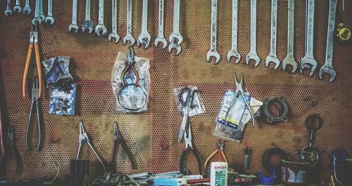 Clothes hanging for sale at market stall