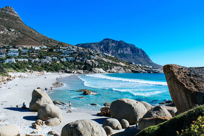 Scenic view of sea against clear blue sky