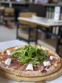 Close-up of pizza served in plate