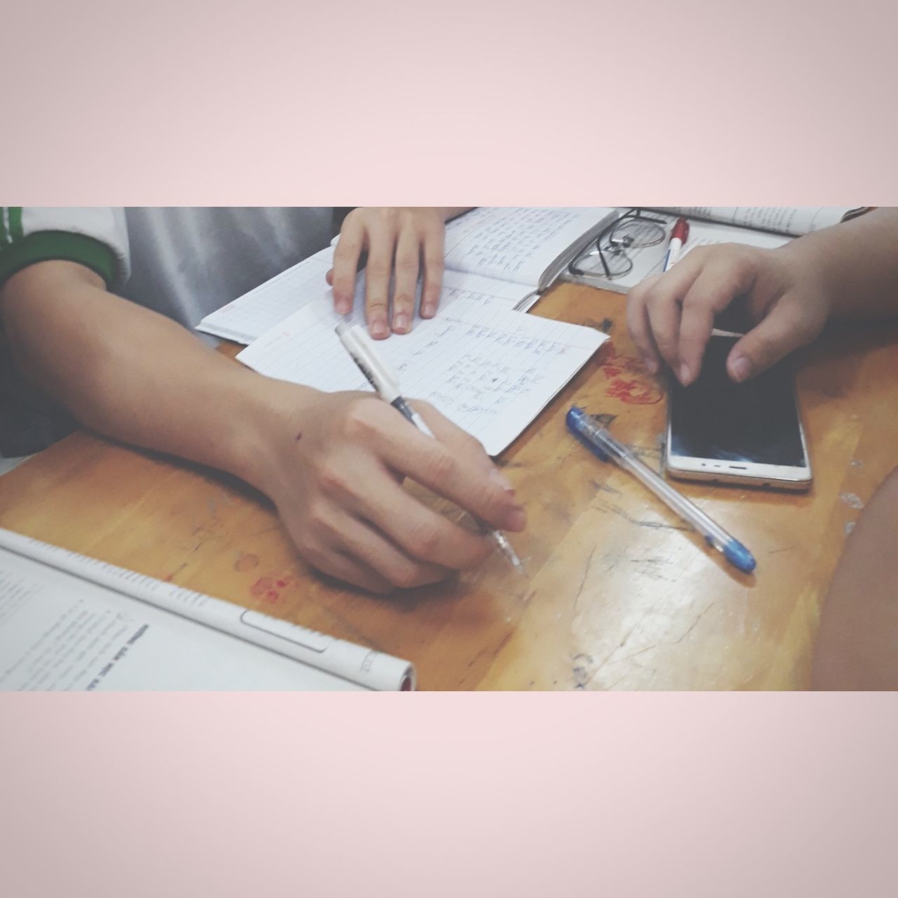 pen, human hand, indoors, table, real people, writing, paper, desk, human body part, holding, text, one person, book, learning, technology, wireless technology, close-up, sitting, diary, women, day, people