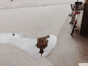 Man riding bicycle on road